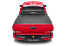 Load image into Gallery viewer, RNLroll-n-lock-m-series-2022-toyota-tacoma-red-studio-07.jpg